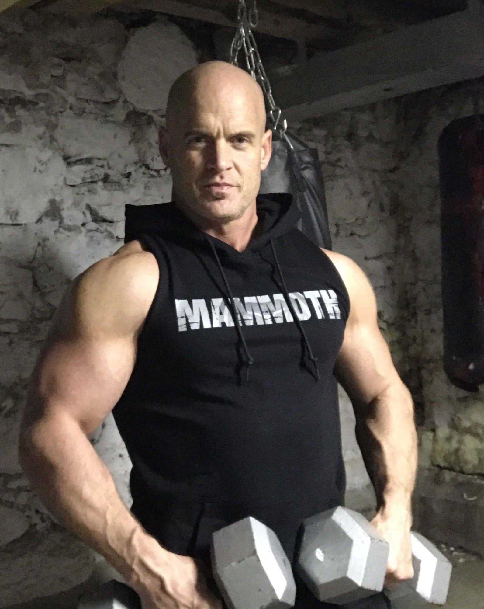 Mammoth Classic Sleeveless Hoodie with sleek cut can be worn in or outside of the gym. This will become a staple. Comfort. Style. Weight training. Workouts. Bodybuilding. Men's Fitness Apparel. Tank. Canada. MAMMOTH APPAREL