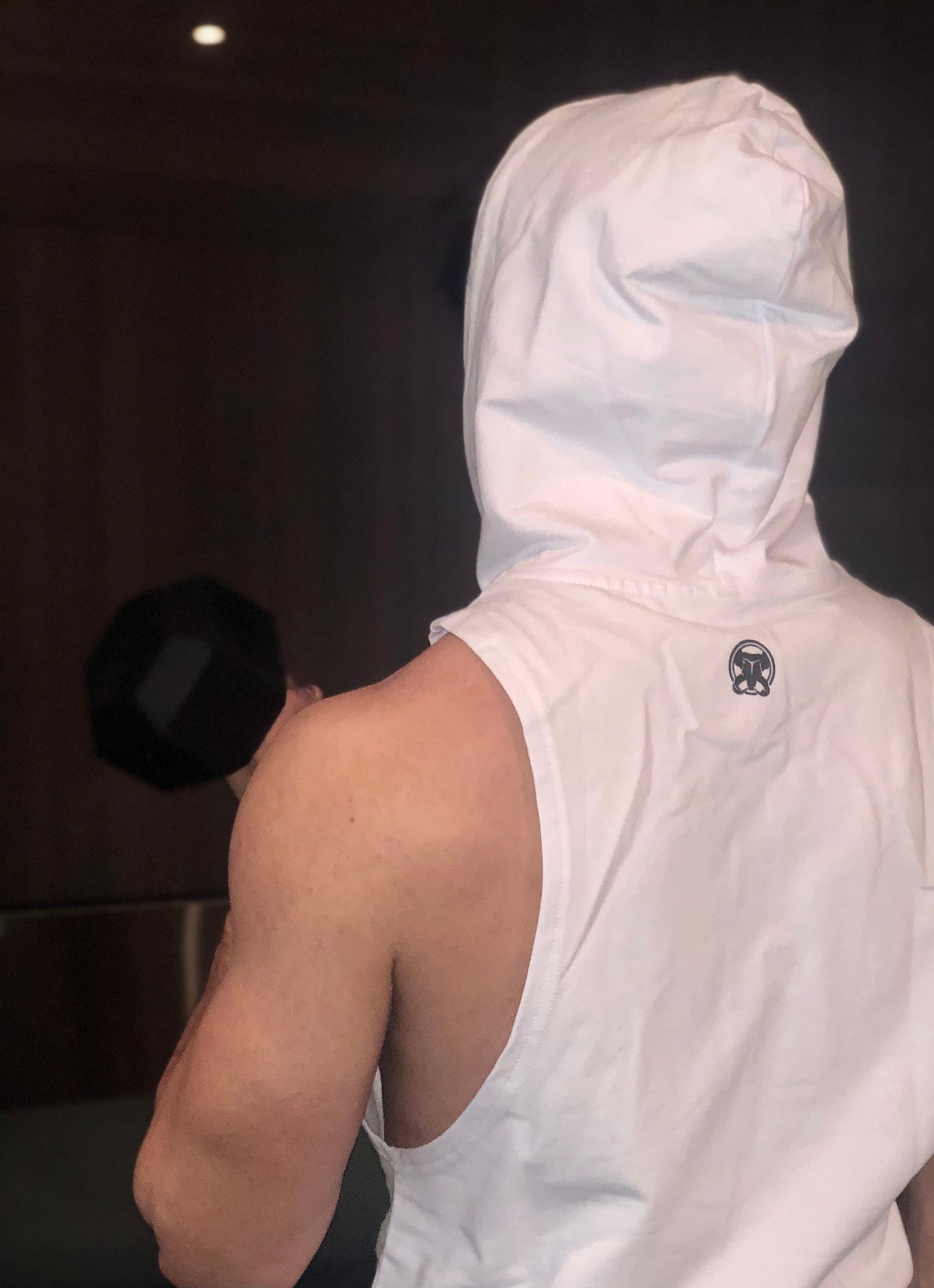 MAMMOTH White drop Sleeveless Hoodie. Show off your hard work at the gym or home workout. Weight training apparel. Bodybuilding. Men's Fitness Apparel. Canada. Men's training tank.  Edit alt text