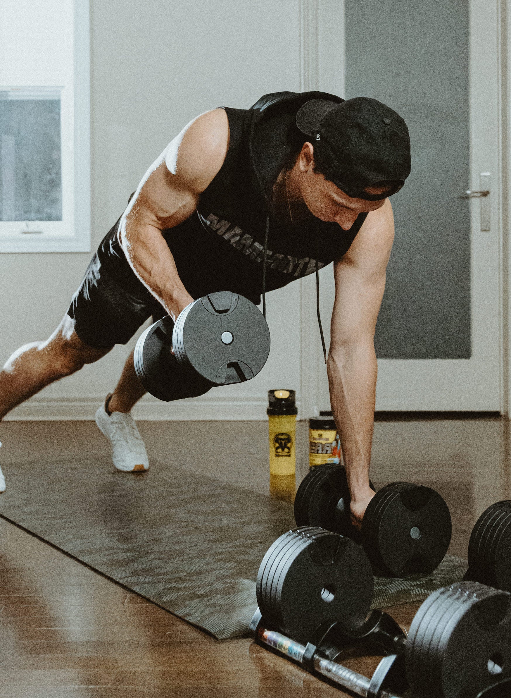 Mammoth Classic Sleeveless Hoodie with sleek cut can be worn in or outside of the gym. This will become a staple. Comfort. Style. Weight training. Workouts. Bodybuilding. Men's Fitness Apparel. Tank. Canada. MAMMOTH APPAREL Home Workout. Weights. Mammoth Switch Adjustable Dumbbells. Home workout. Supplements. EAA BCAA