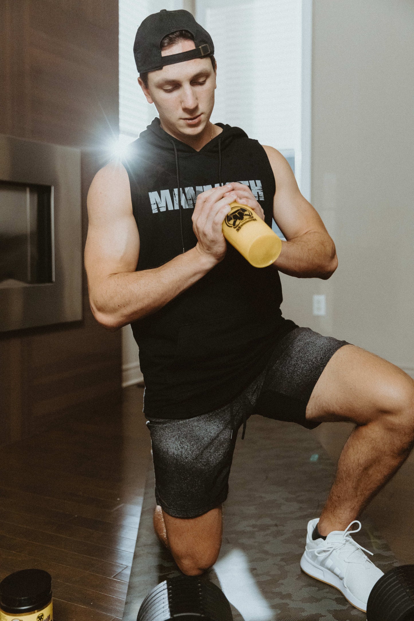 Mammoth Classic Sleeveless Hoodie with sleek cut can be worn in or outside of the gym. This will become a staple. Comfort. Style. Weight training. Workouts. Bodybuilding. Men's Fitness Apparel. Tank. Canada. MAMMOTH APPAREL Home Workout. Weights. Mammoth Switch Adjustable Dumbbells.