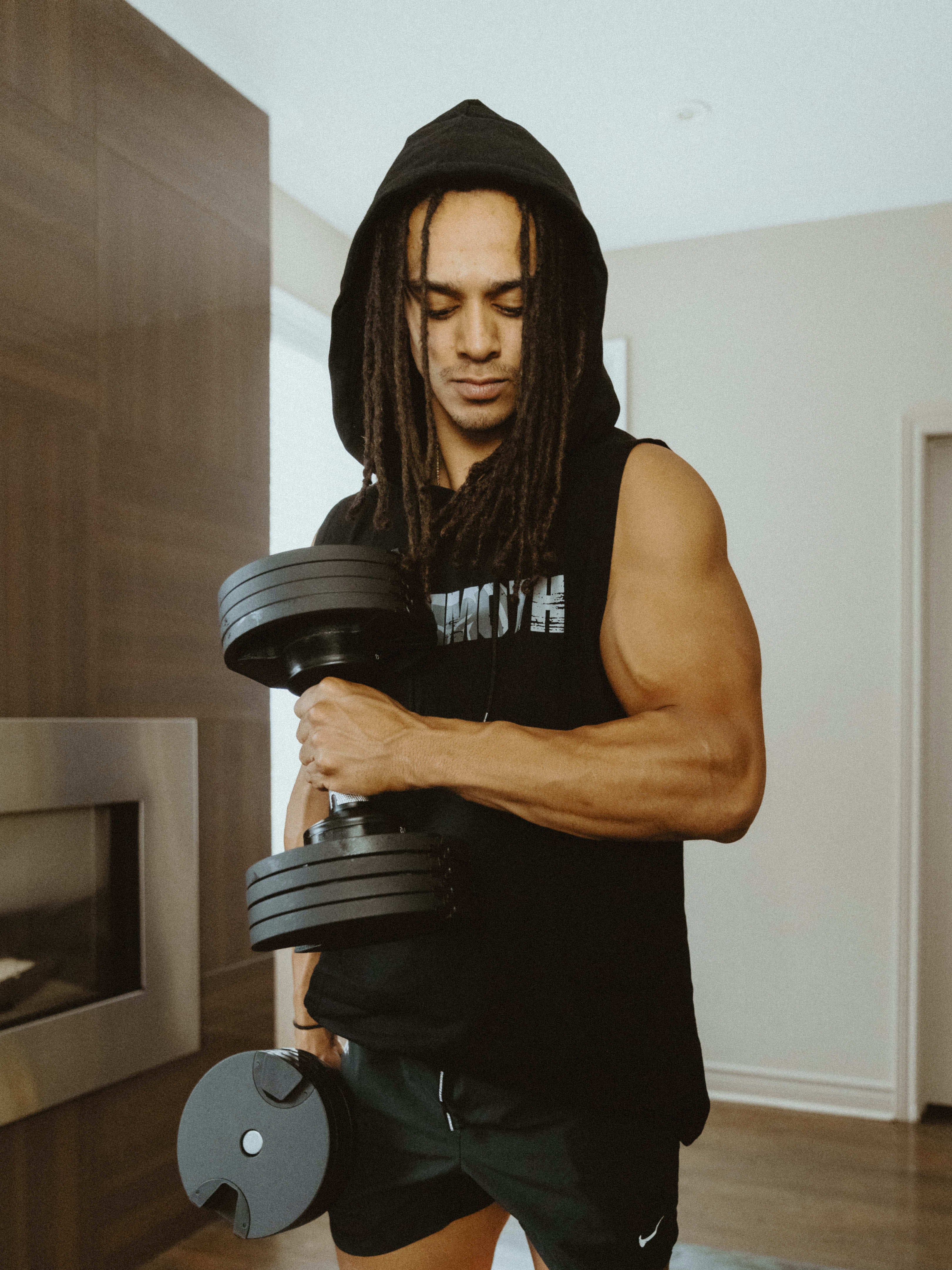 Mammoth Classic Sleeveless Hoodie with sleek cut can be worn in or outside of the gym. This will become a staple. Comfort. Style. Weight training. Workouts. Bodybuilding. Men's Fitness Apparel. Tank. Canada. MAMMOTH APPAREL Home Workout. Weights. Mammoth Switch Adjustable Dumbbells.