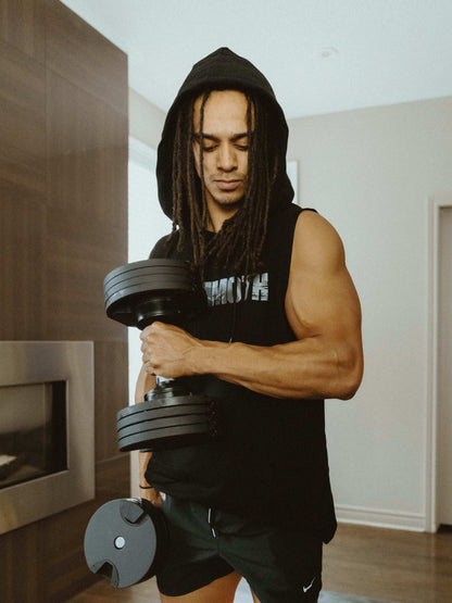 Mammoth Classic Sleeveless Hoodie with sleek cut can be worn in or outside of the gym. This will become a staple. Comfort. Style. Weight training. Workouts. Bodybuilding. Men's Fitness Apparel. Tank. Canada. MAMMOTH APPAREL Home Workout. Weights. Mammoth Switch Adjustable Dumbbells.